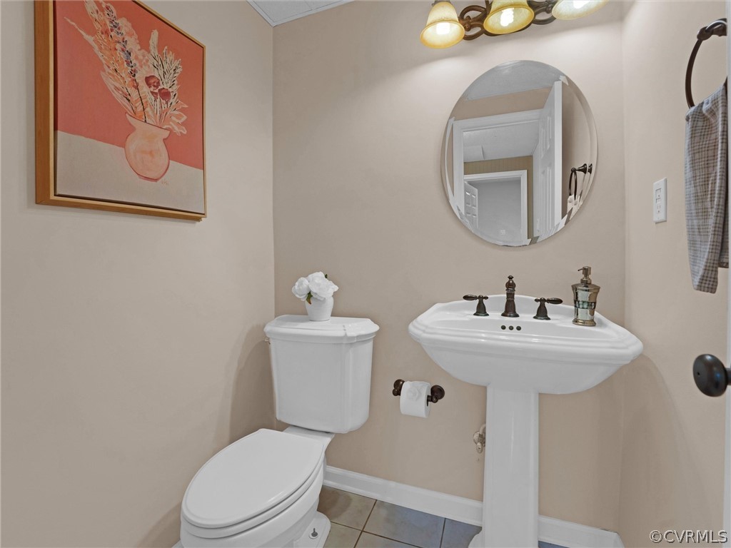 12100 2nd Branch Road Chesterfield, VA 23838 - Photo 31 of 41 a bathroom with a toilet sink and mirror