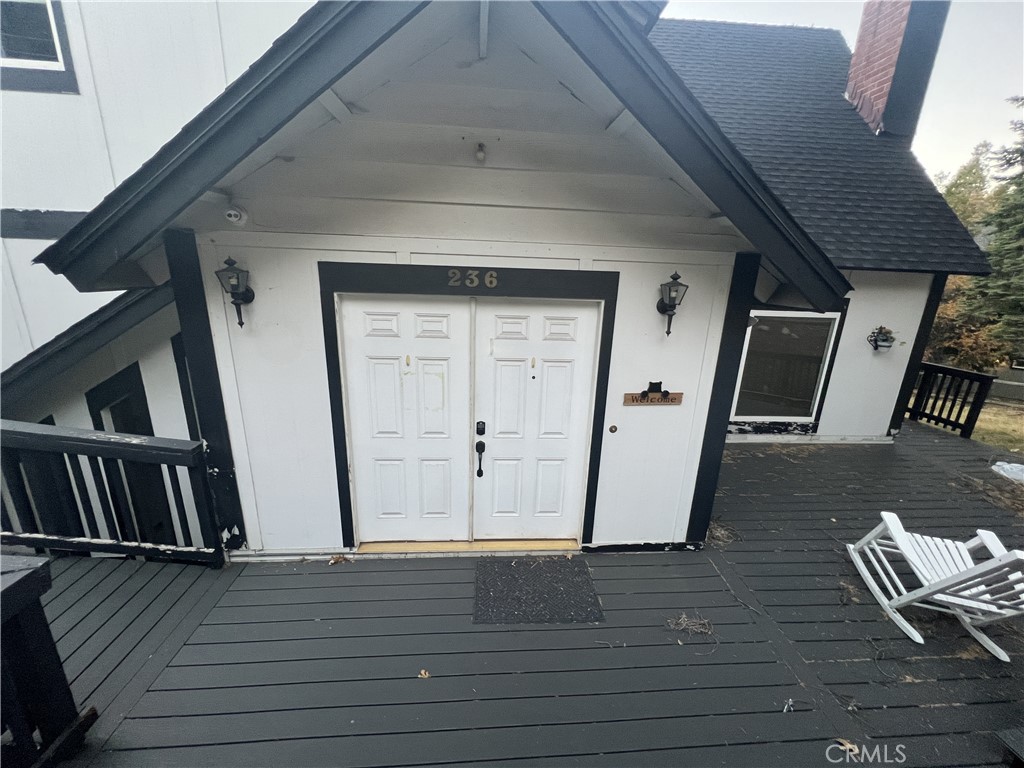 236 North Grass Valley Road Lake Arrowhead, CA 92352 - Photo 2 of 4 a view of an entryway with wooden floor