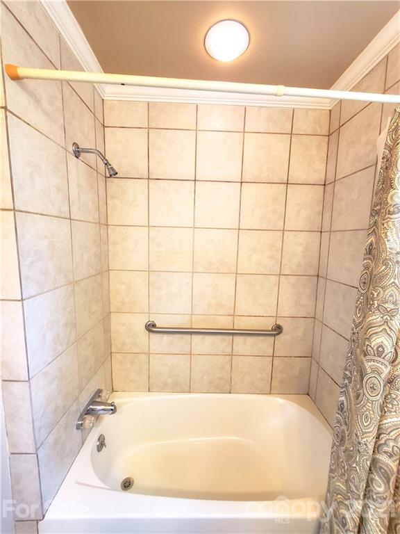 602 Self Street Cherryville, NC 28021 - Photo 11 of 22 a bathroom with a bathtub