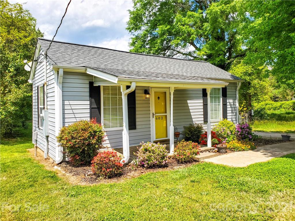602 Self Street Cherryville, NC 28021 - Photo 3 of 22 a front view of a house with garden