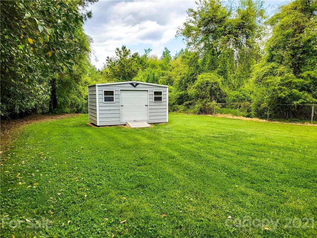 602 Self Street Cherryville, NC 28021 - Photo 21 of 22 a view of a house with a yard