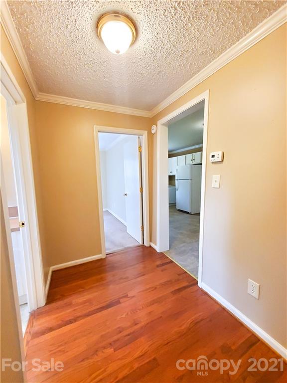 602 Self Street Cherryville, NC 28021 - Photo 8 of 22 a bedroom with a bed and bathroom