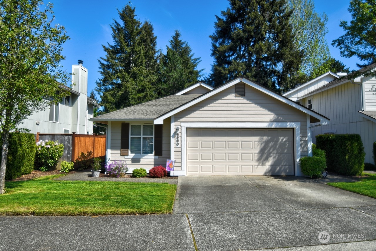 4530 Beckonridge Loop Southeast Lacey, WA 98513 - Photo 1 of 28 a view of a house with backyard and garden