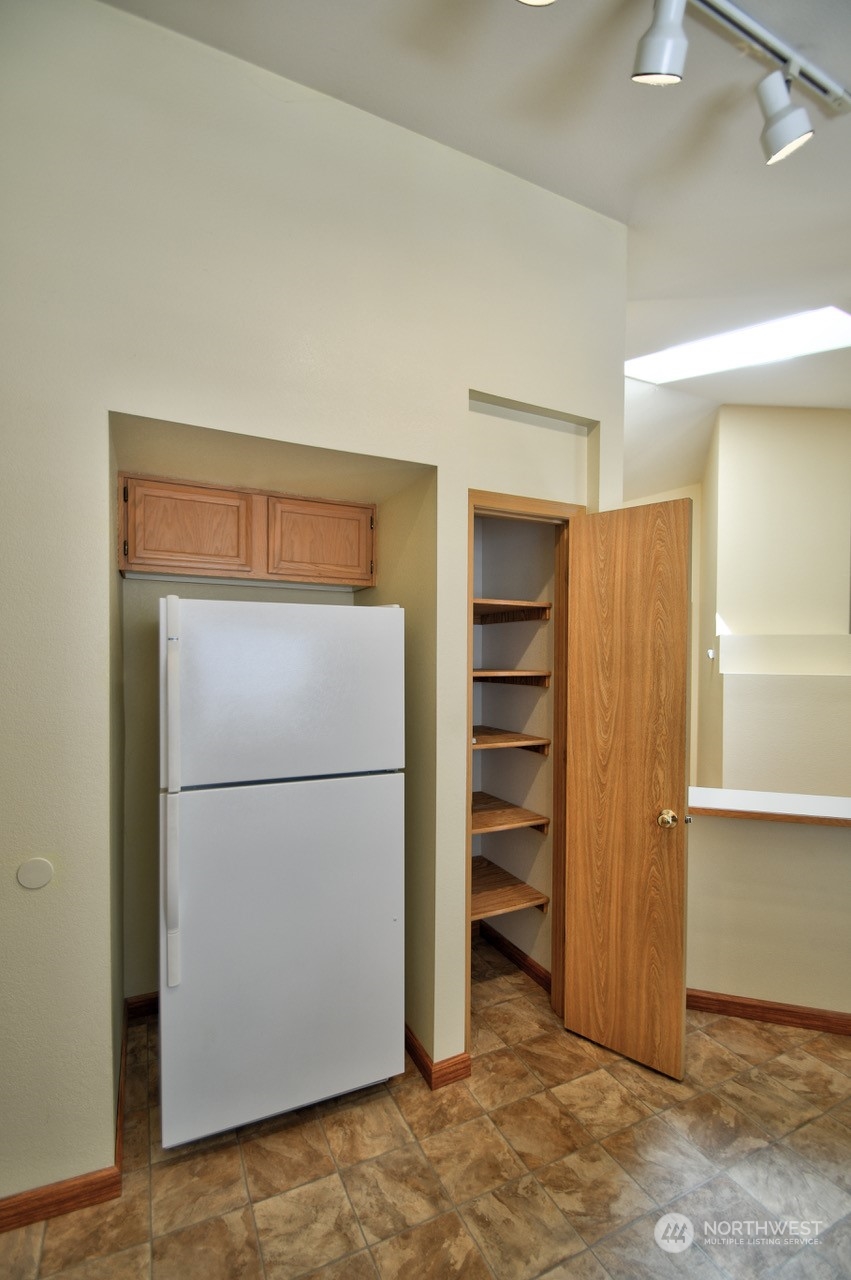 4530 Beckonridge Loop Southeast Lacey, WA 98513 - Photo 12 of 28 a view of walk in closet with empty racks