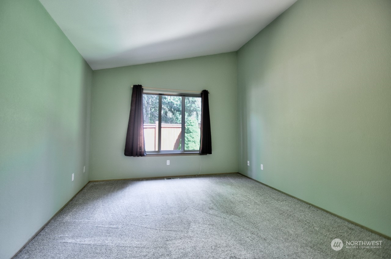 4530 Beckonridge Loop Southeast Lacey, WA 98513 - Photo 14 of 28 an empty room with a window