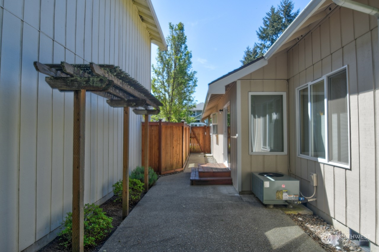 4530 Beckonridge Loop Southeast Lacey, WA 98513 - Photo 24 of 28 a backyard of a house with outdoor seating