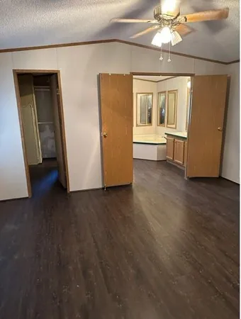 a view of a livingroom with a hardwood floor