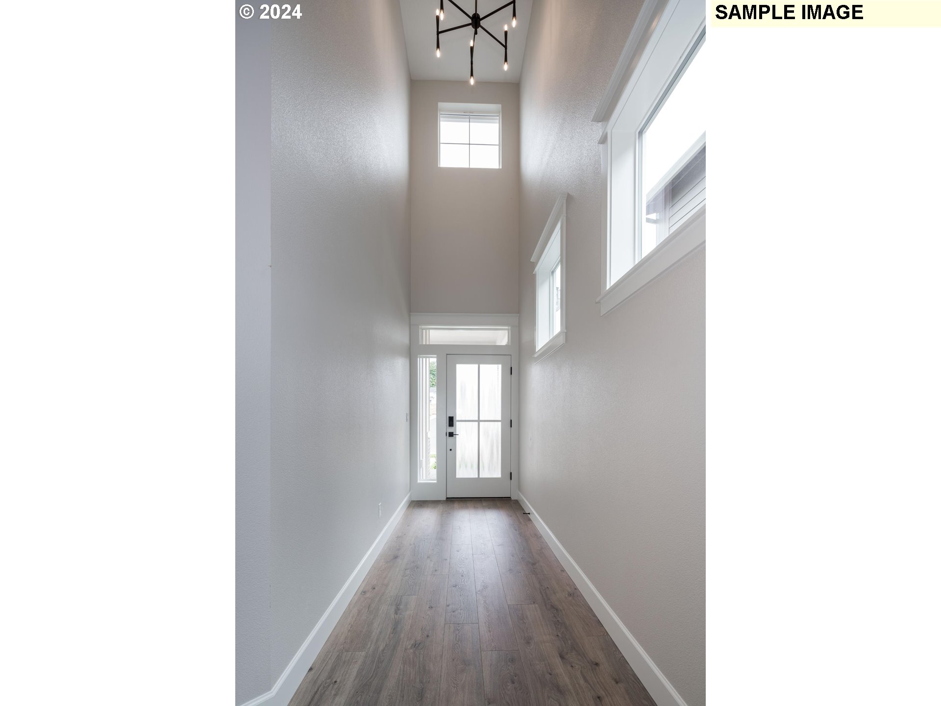 1127 South 46th Place Ridgefield, WA 98642 - Photo 3 of 26 a view of a hallway with windows