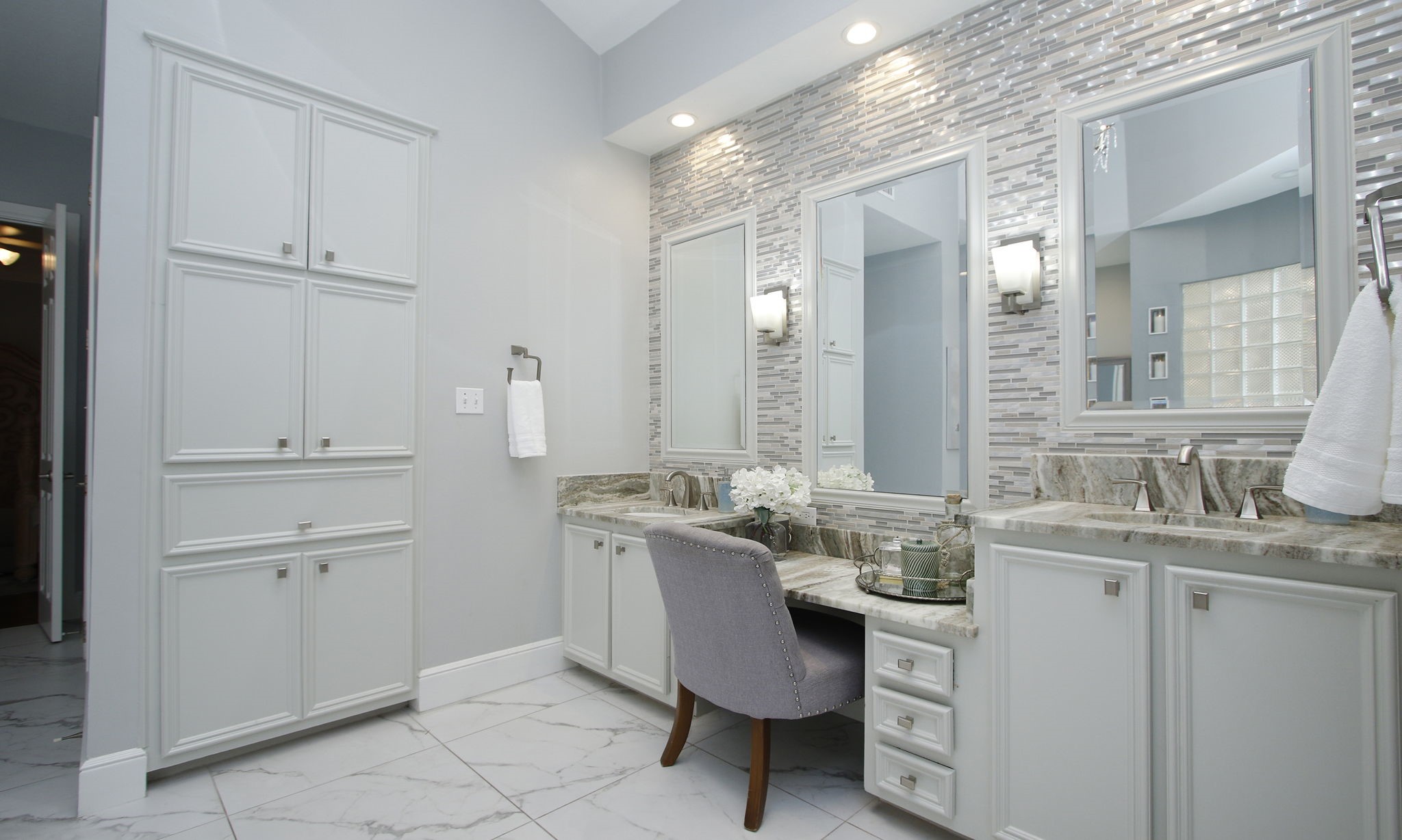 16610 Manningtree Lane Spring, TX 77379 - Photo 21 of 50 The primary bathroom has two sinks, granite vanities and wonderful storage.