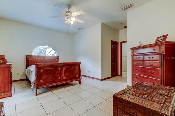 a bathroom with a double vanity sink mirror and shower