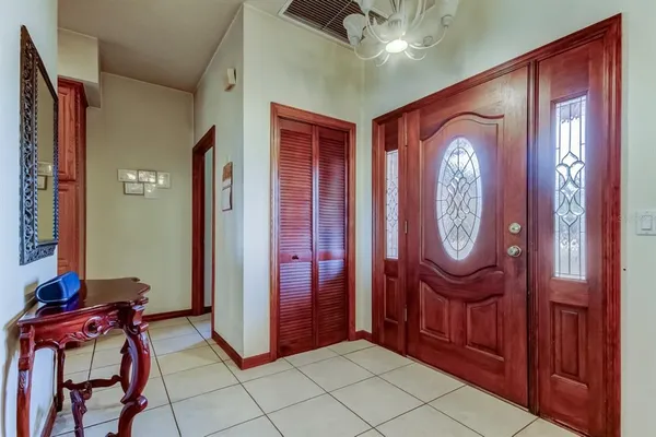 a view of a hallway with seating area