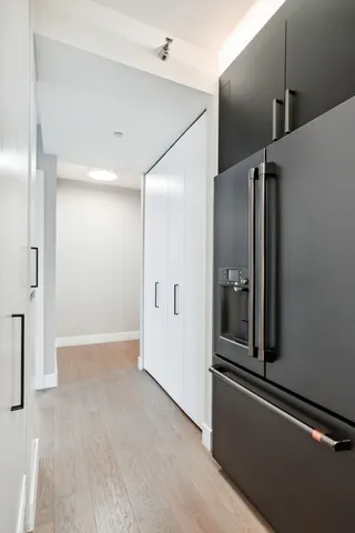 a view of a hallway with entryway