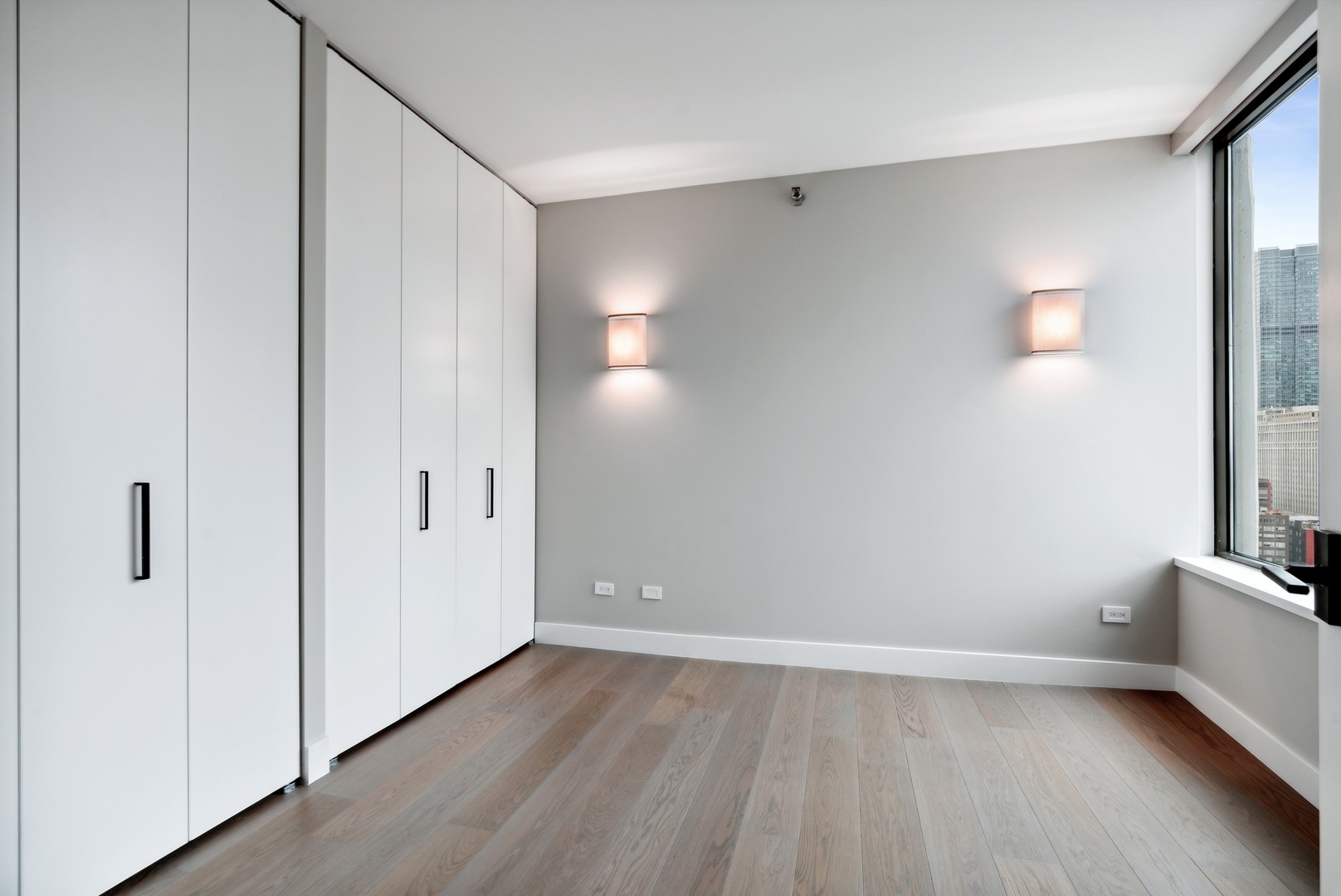 501 North Clinton Street, Unit 2004 Chicago, IL 60654 - Photo 21 of 34 a view of a room with wooden floor