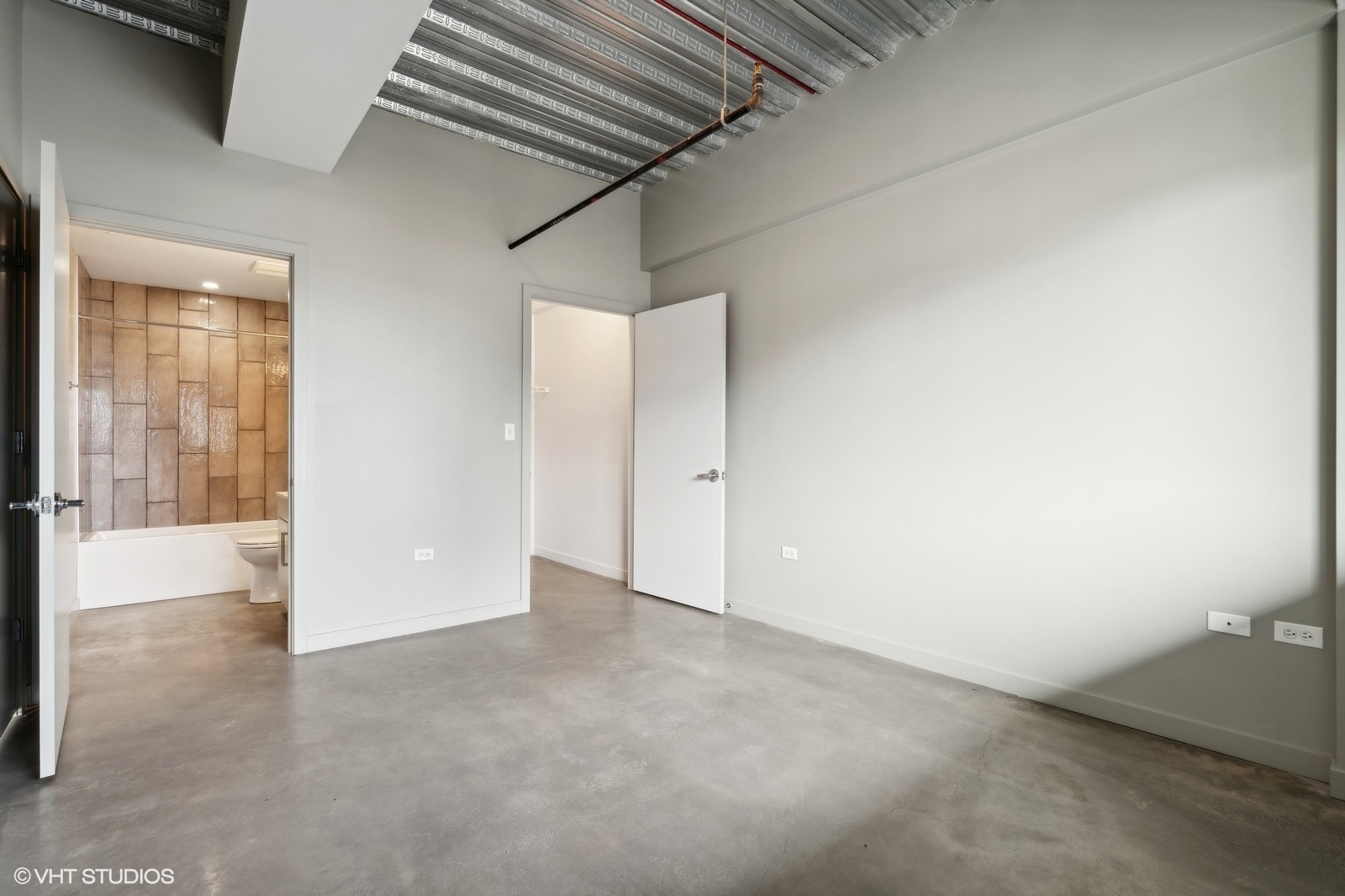 1241 North Milwaukee Avenue, Unit 306 Chicago, IL 60622 - Photo 12 of 14 a view of an empty room