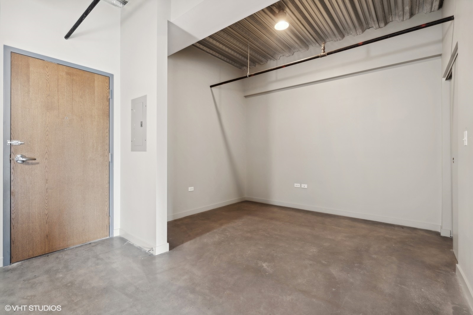 1241 North Milwaukee Avenue, Unit 306 Chicago, IL 60622 - Photo 9 of 14 a view of an empty room