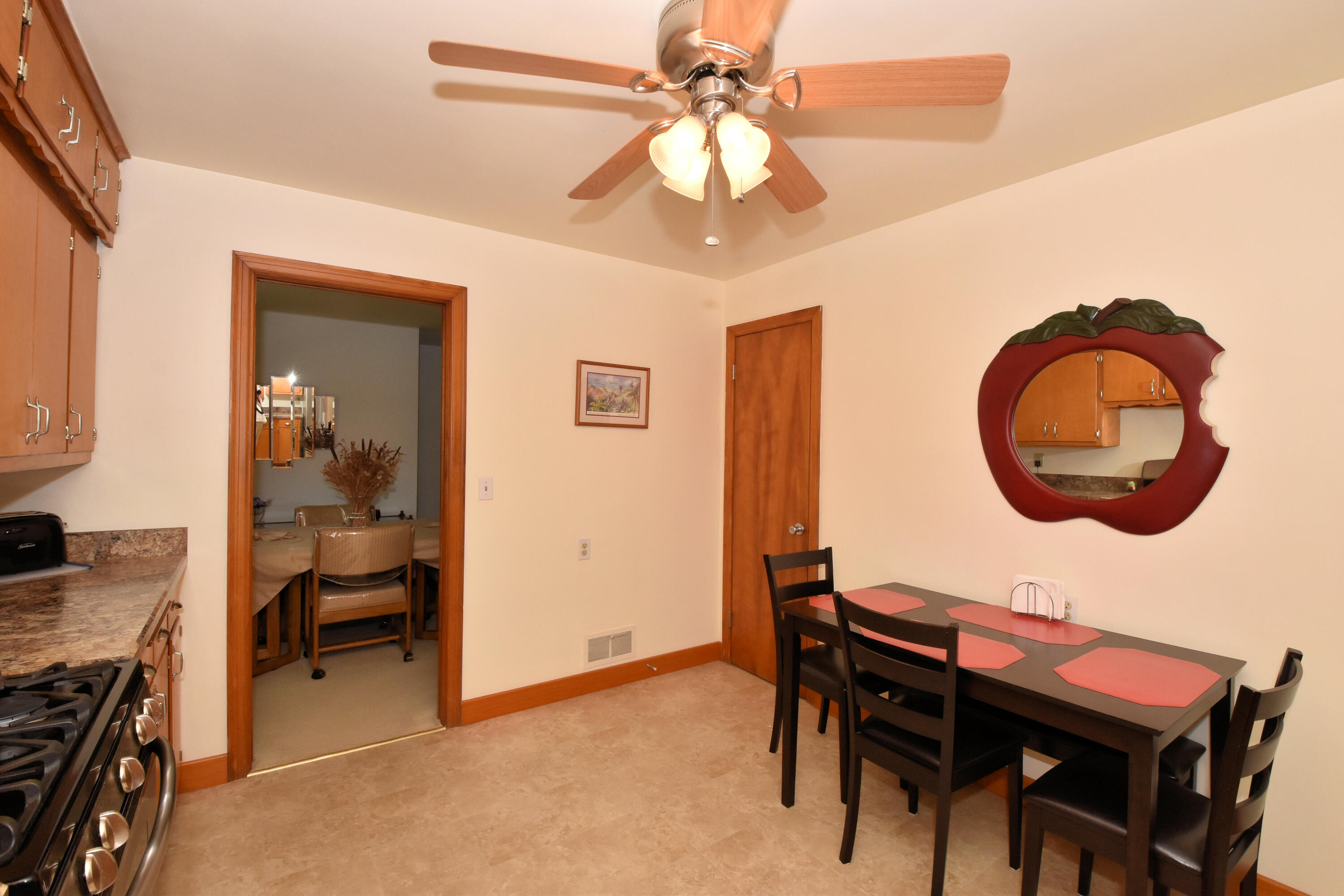1923 Arlington Avenue Racine, WI 53403 - Photo 11 of 31 Kitchen has a pantry for extra storage.
