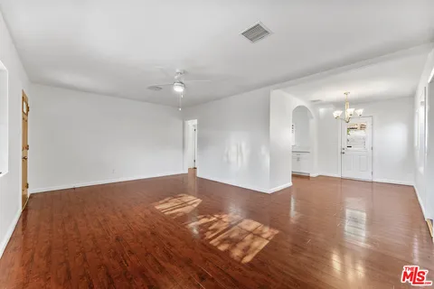 a view of a livingroom with wooden floor