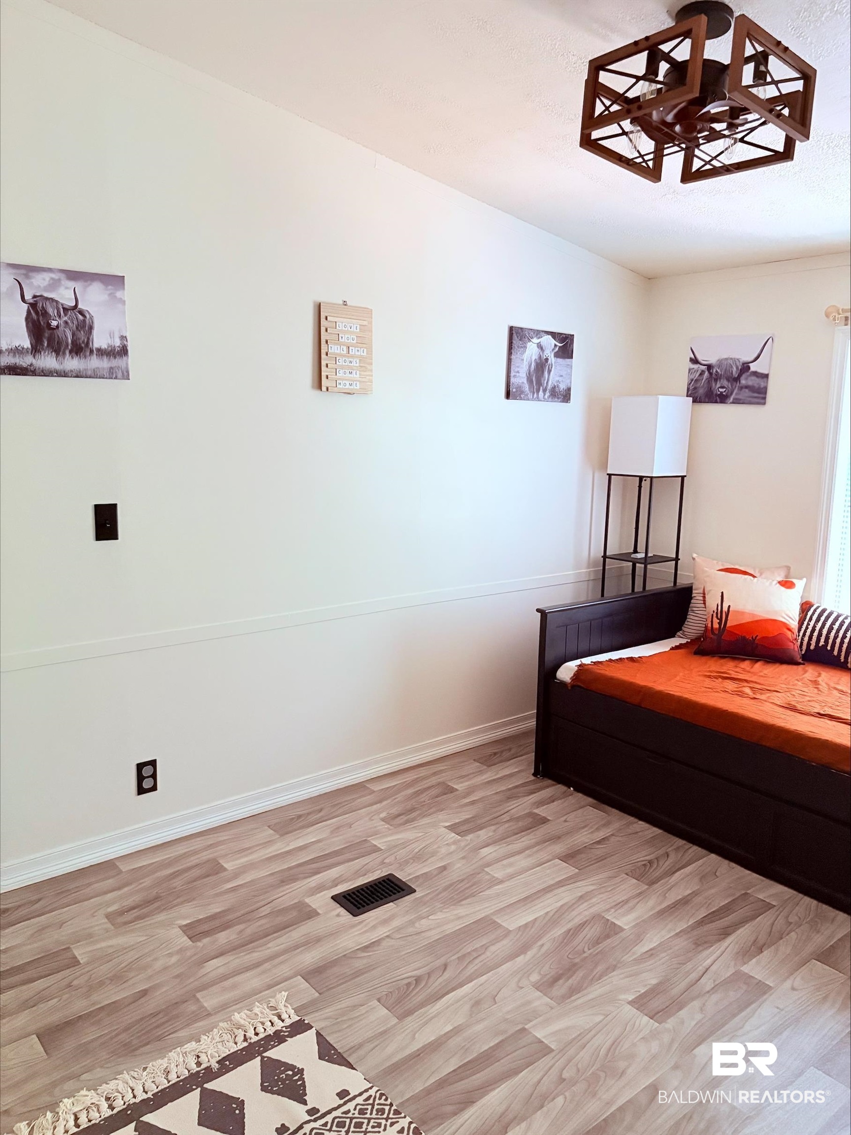12020 Bay Road West Foley, AL 36535 - Photo 23 of 30 Bedroom with light wood-type flooring and baseboards