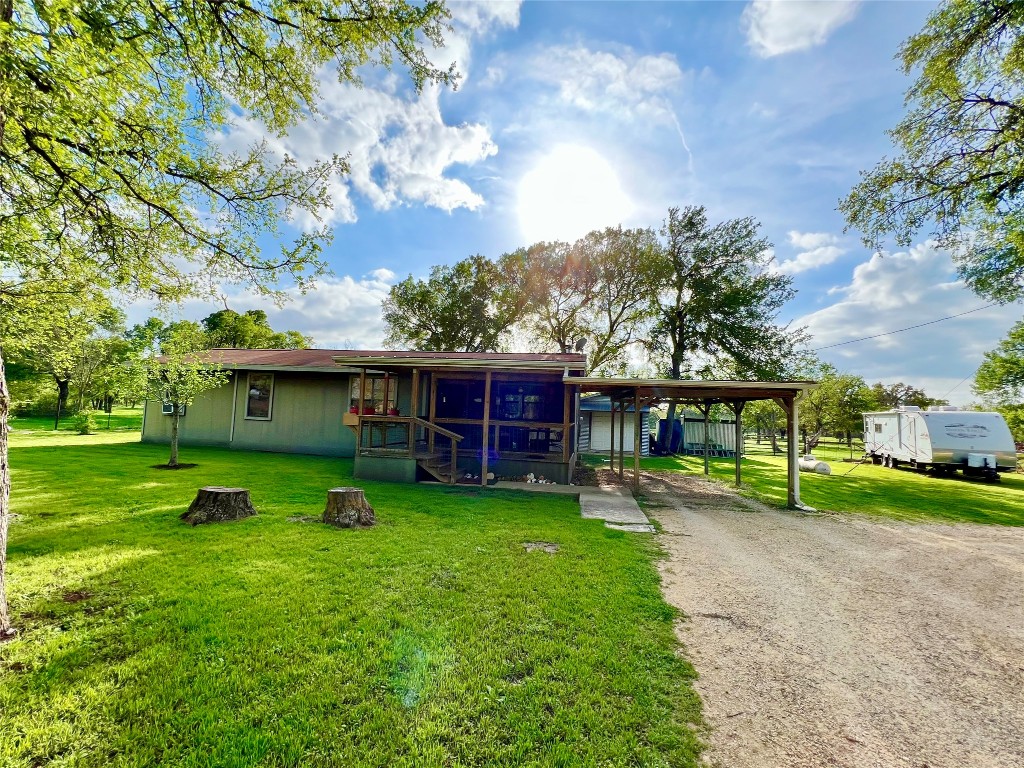 2700 County Road 305 Jarrell, TX 76537 - Photo 2 of 33 a view of a yard in front of house