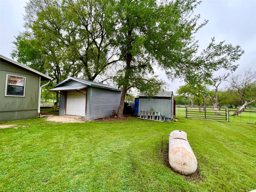 2700 County Road 305 Jarrell, TX 76537 - Photo 23 of 33 a view of a house with backyard