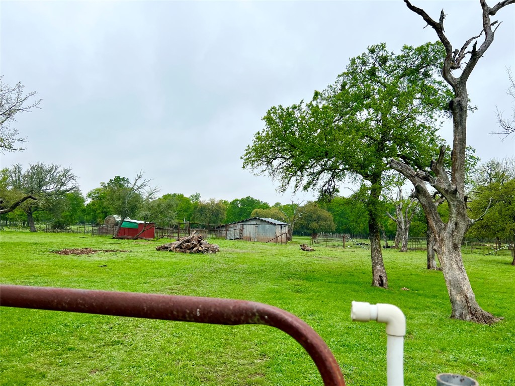 2700 County Road 305 Jarrell, TX 76537 - Photo 26 of 33 a view of a golf course with a lake view