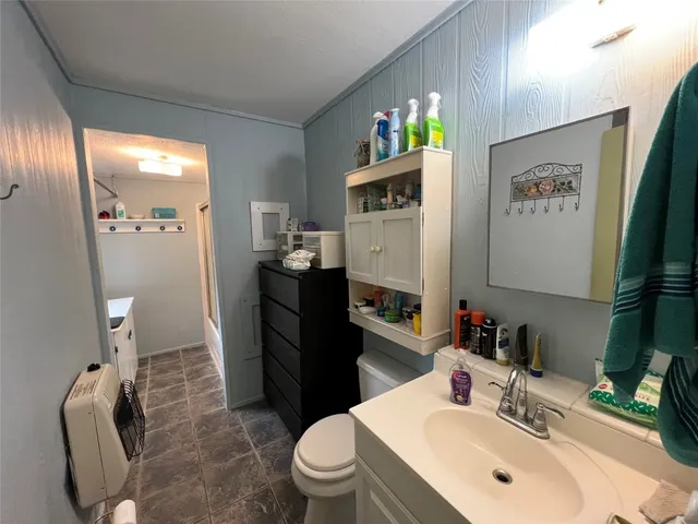 a view of a living room and dining room