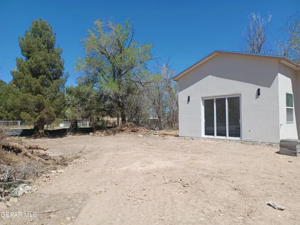 a view of a house with a snow in the yard