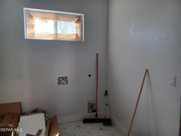 a bathroom with a toilet and a sink