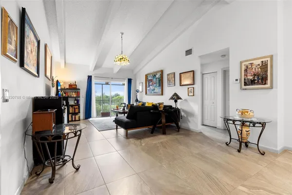 a bed room with furniture and a window