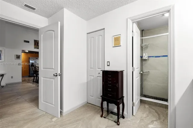 a view of entryway with wooden floor