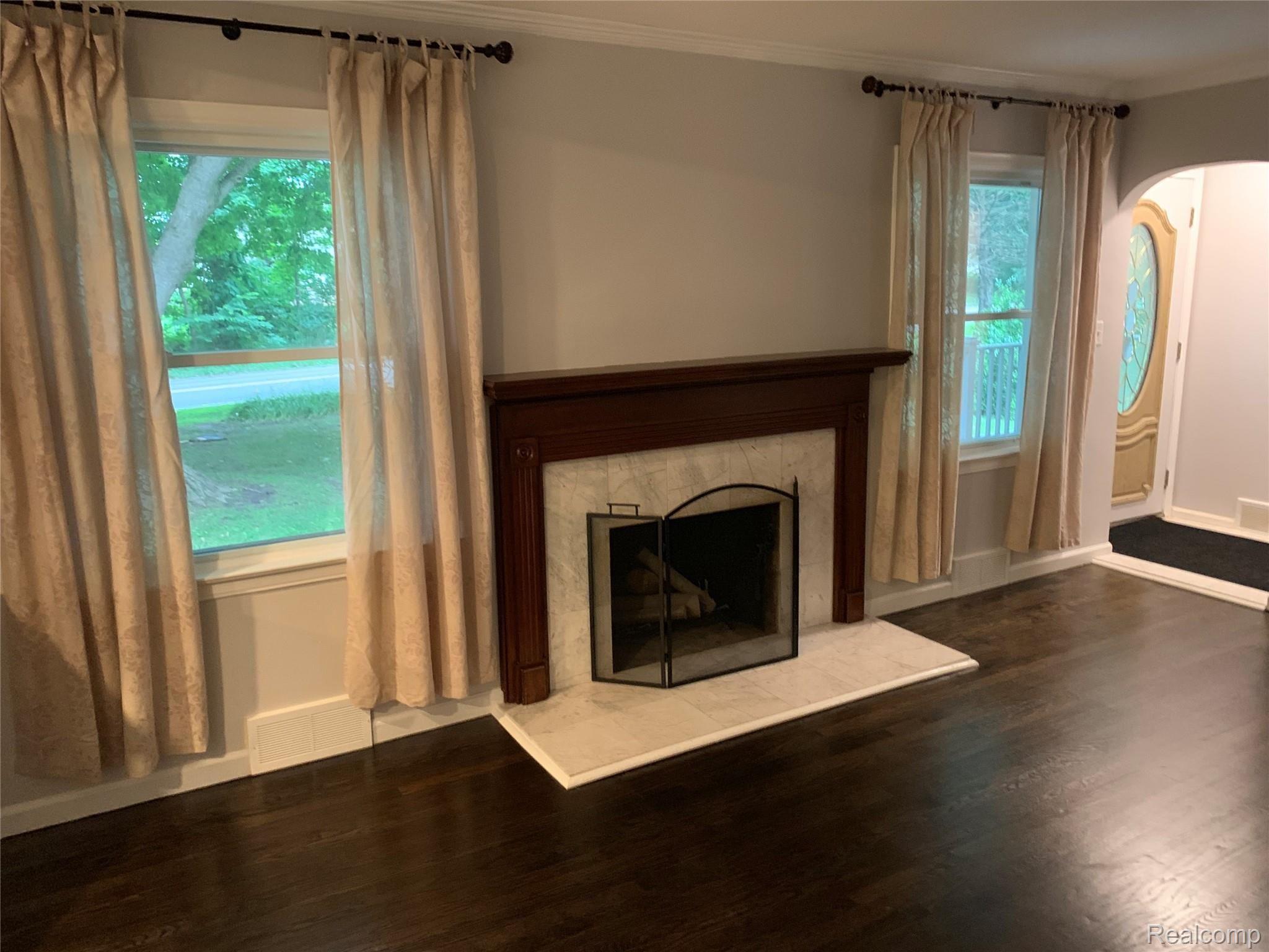 4859 Crooked Lake Road Howell, MI 48843 - Photo 23 of 90 Family Room with beautiful Hardwood and Fireplace