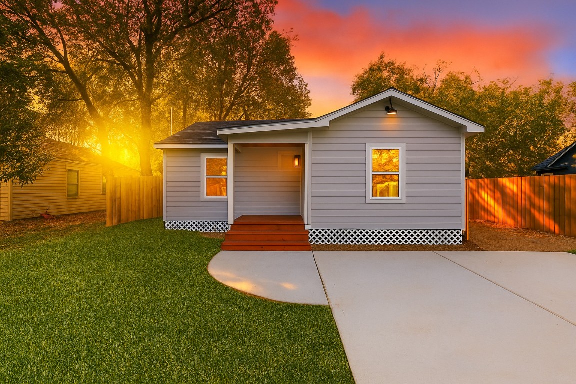 Fresh siding, new windows, and a brand-new foundation give this charming home a solid, like-new feel from the moment you pull up. The widened front porch, new driveway, and privacy fencing frame a green lawn and mature trees for welcoming curb appeal.