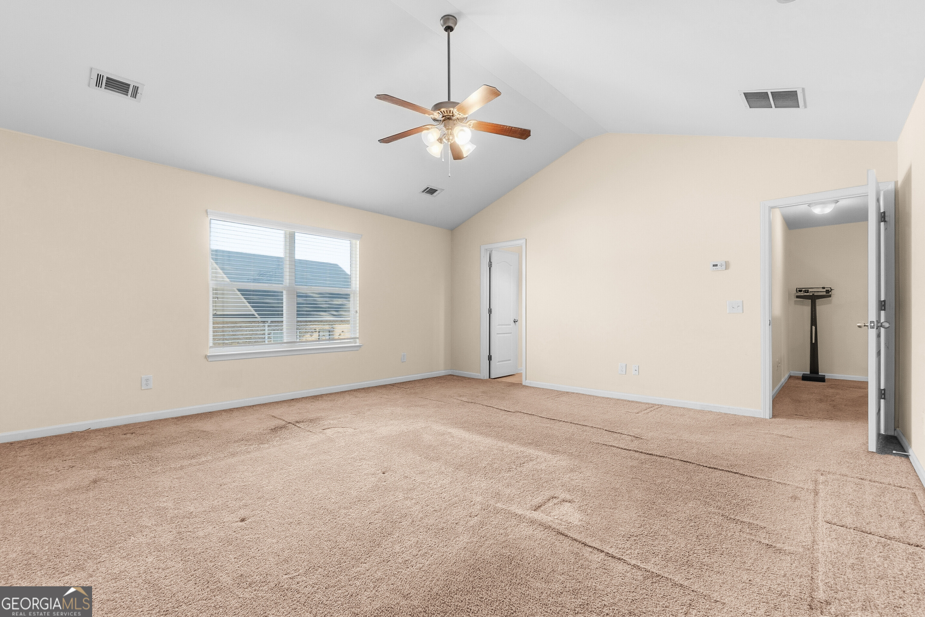 102 Steeple Court Perry, GA 31069 - Photo 16 of 37 a view of an empty room with a window