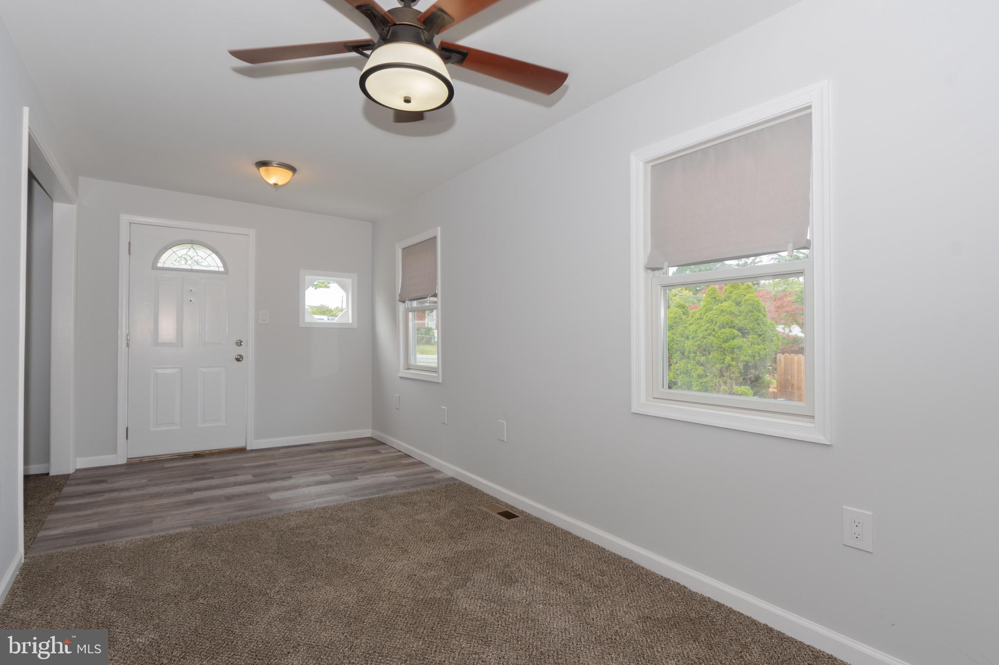 6414 Kenwood Avenue Rosedale, MD 21237 - Photo 13 of 60 an empty room with windows and closet