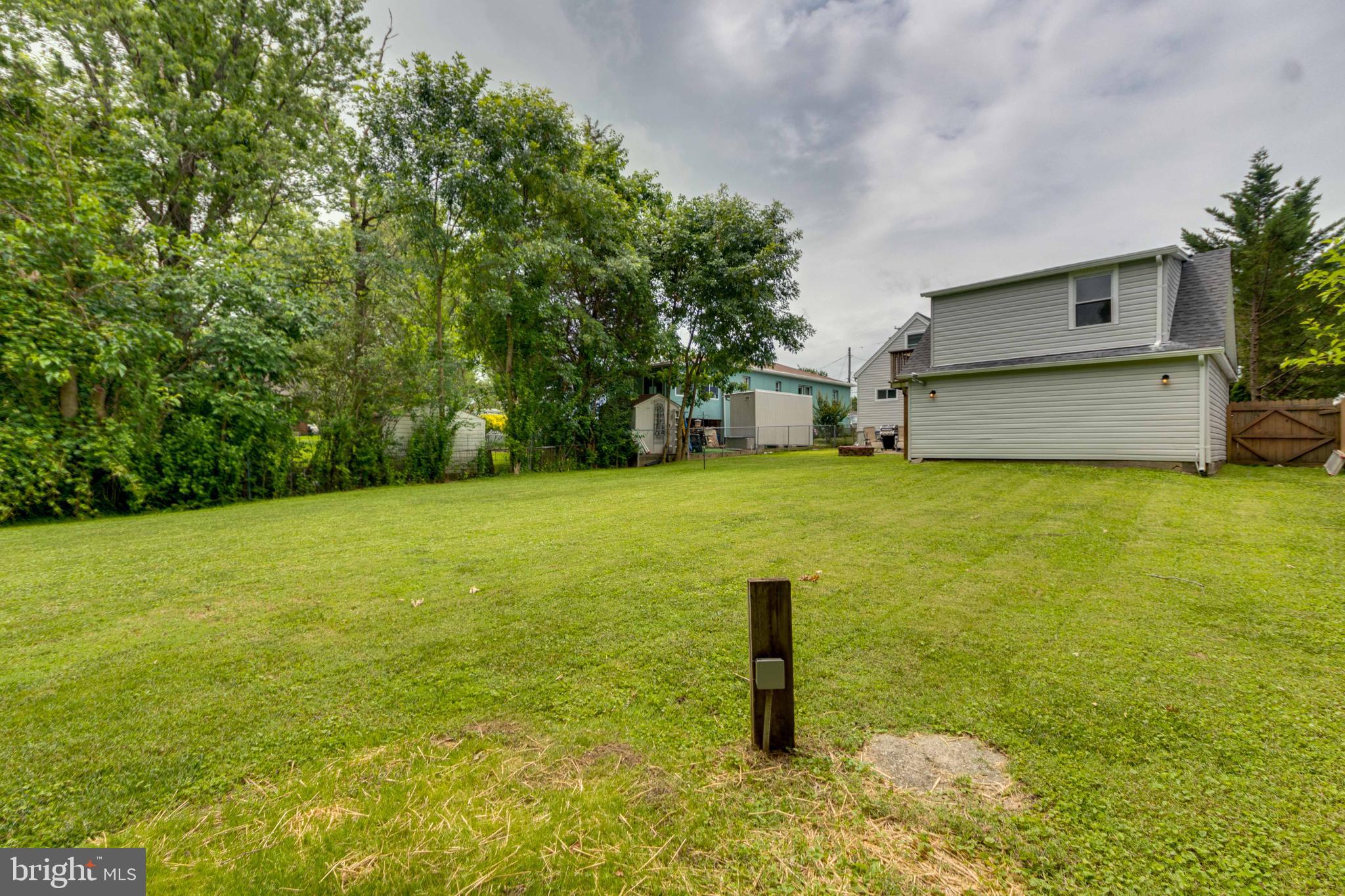 6414 Kenwood Avenue Rosedale, MD 21237 - Photo 52 of 60 a view of a pool with a yard
