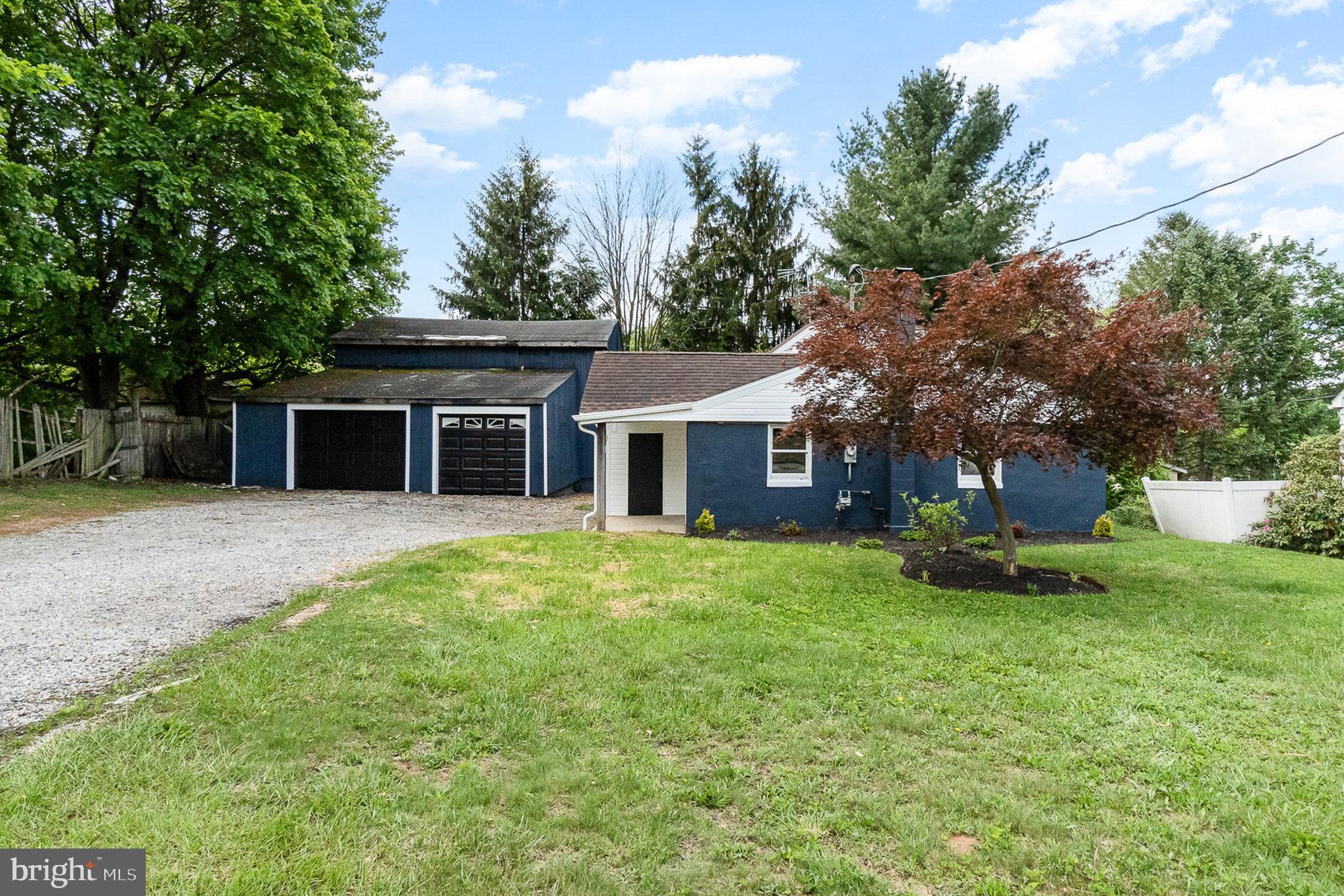 575 Black Rock Road Hanover, PA 17331 - Photo 20 of 22 a front view of a house with a garden and yard