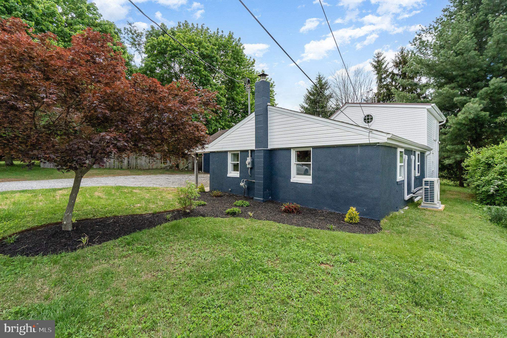 575 Black Rock Road Hanover, PA 17331 - Photo 22 of 22 a front view of house with a garden and trees