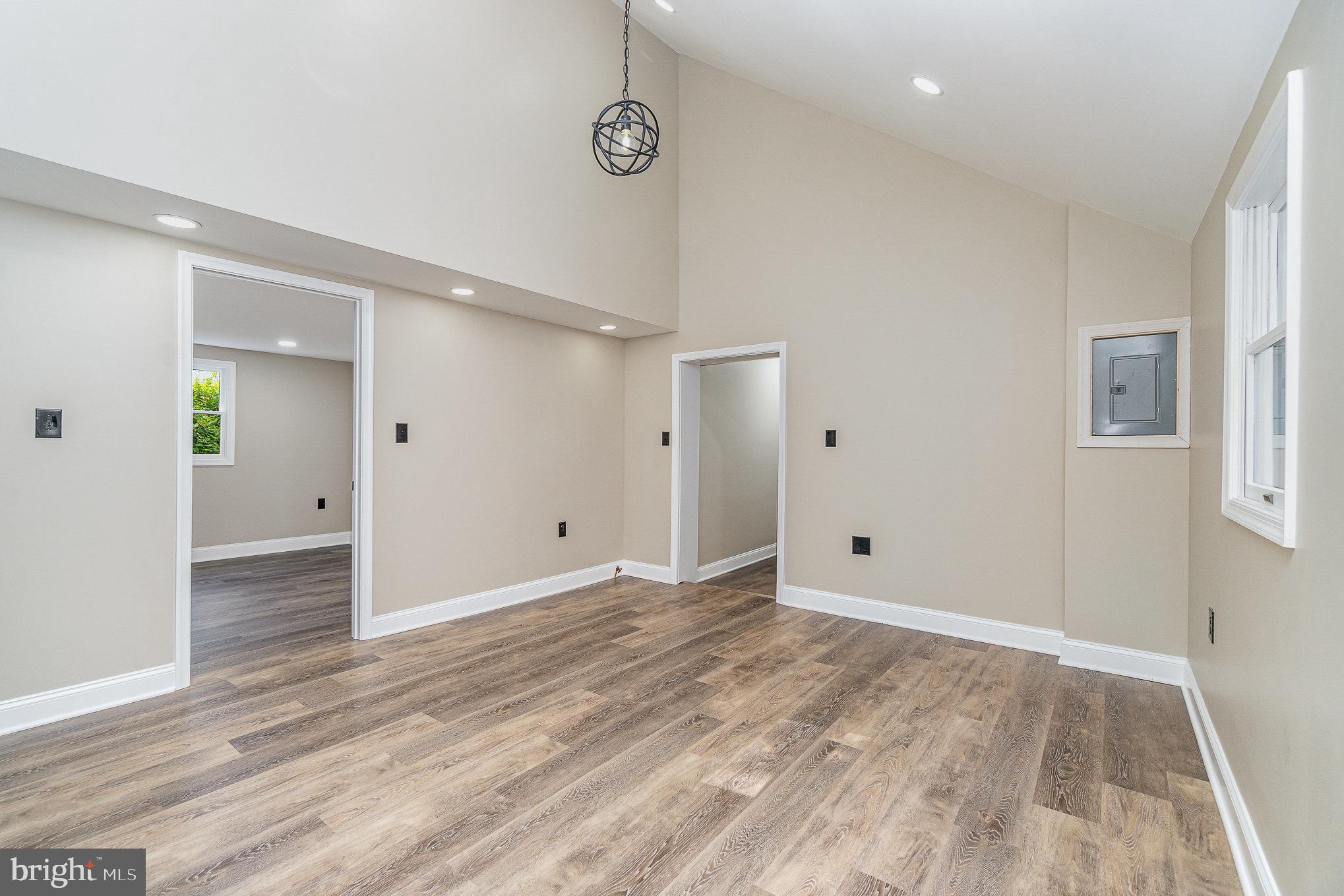 575 Black Rock Road Hanover, PA 17331 - Photo 8 of 22 a view of an empty room with wooden floor and a window