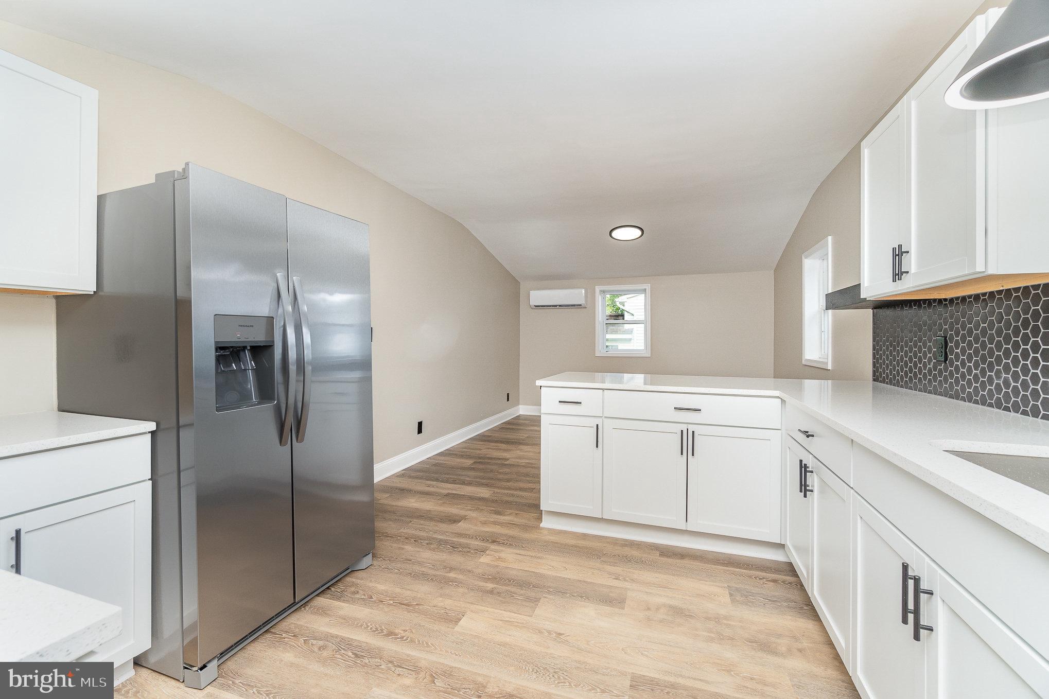 575 Black Rock Road Hanover, PA 17331 - Photo 10 of 22 a kitchen with a refrigerator sink and cabinets