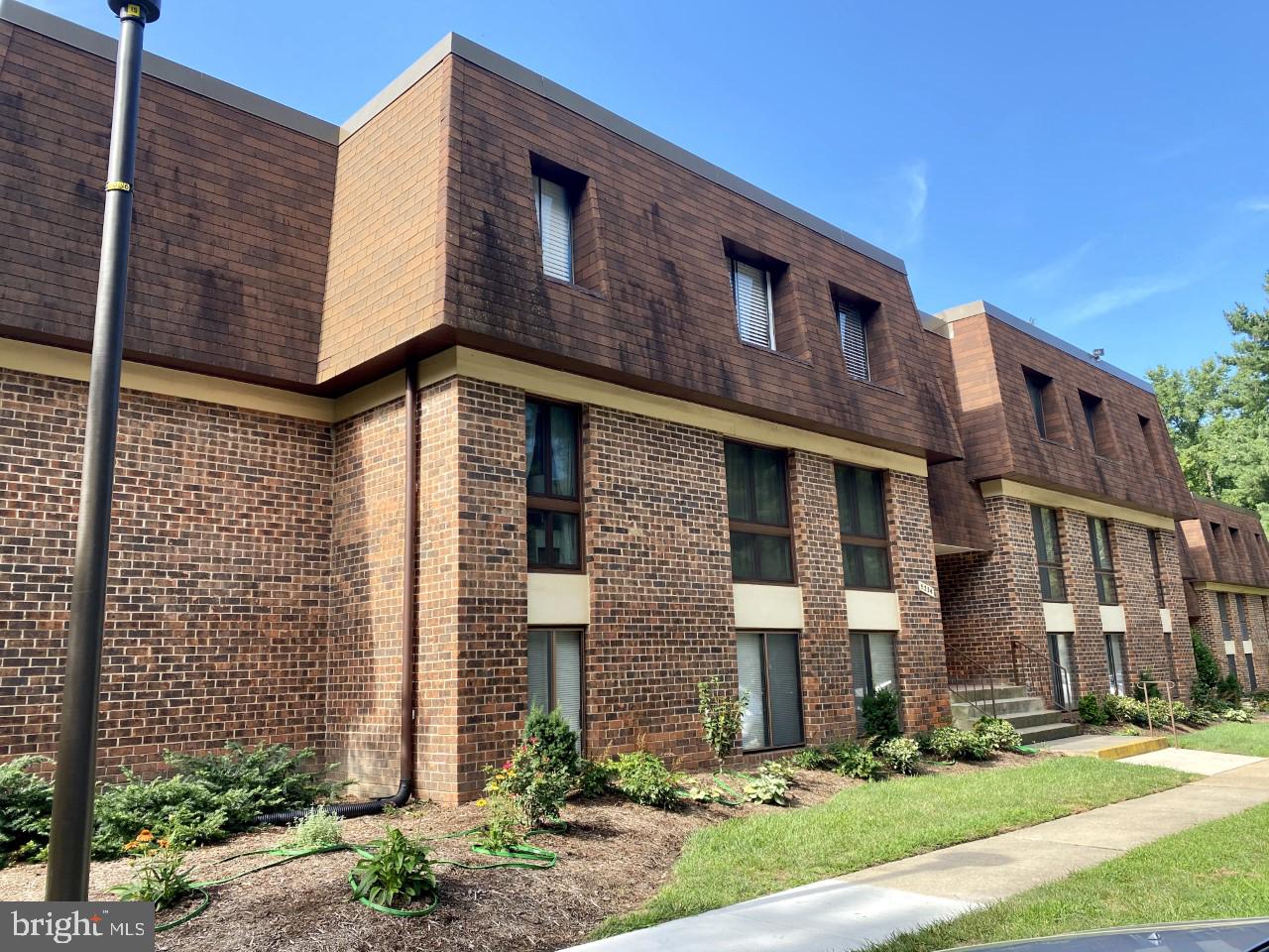 5234 West Running Brook Road, Unit 102 Columbia, MD 21044 - Photo 2 of 44 Nice landscaping in the front