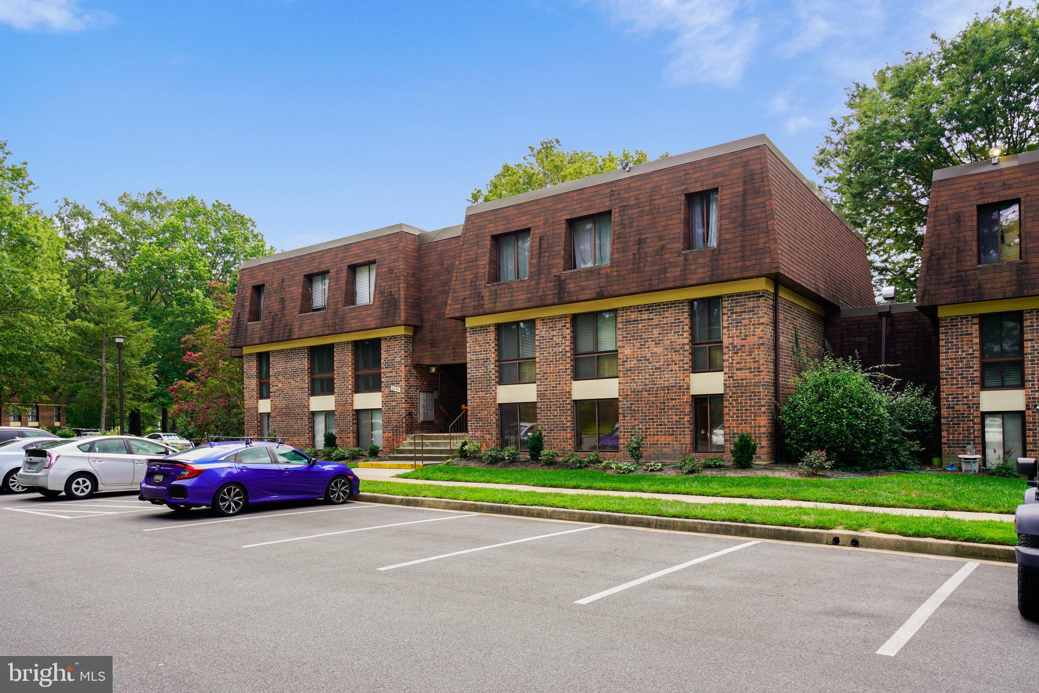 5234 West Running Brook Road, Unit 102 Columbia, MD 21044 - Photo 3 of 44 Plenty of parking in the development