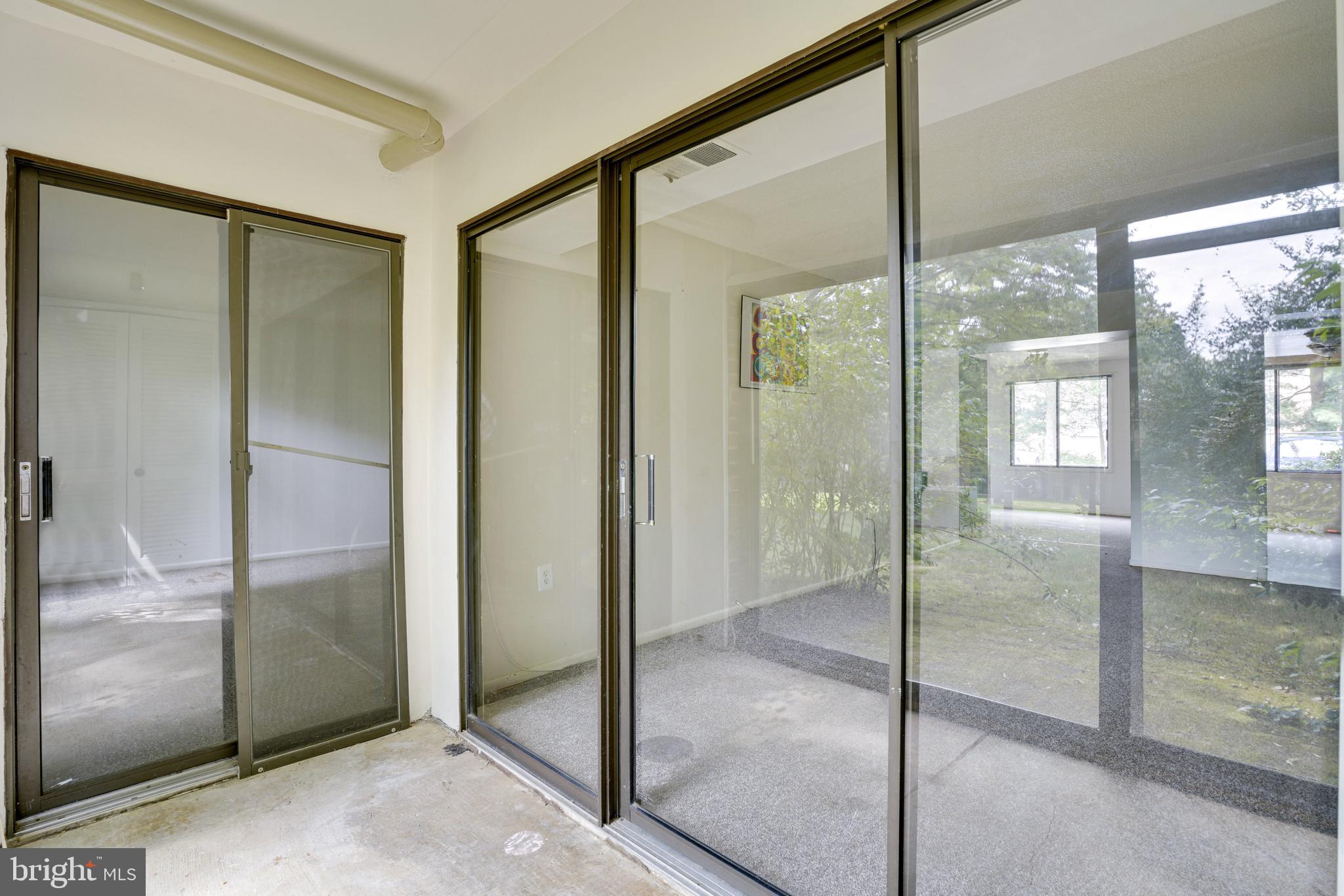 5234 West Running Brook Road, Unit 102 Columbia, MD 21044 - Photo 27 of 44 Enclosed porch