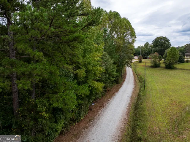 a view of a lake with a building in the background