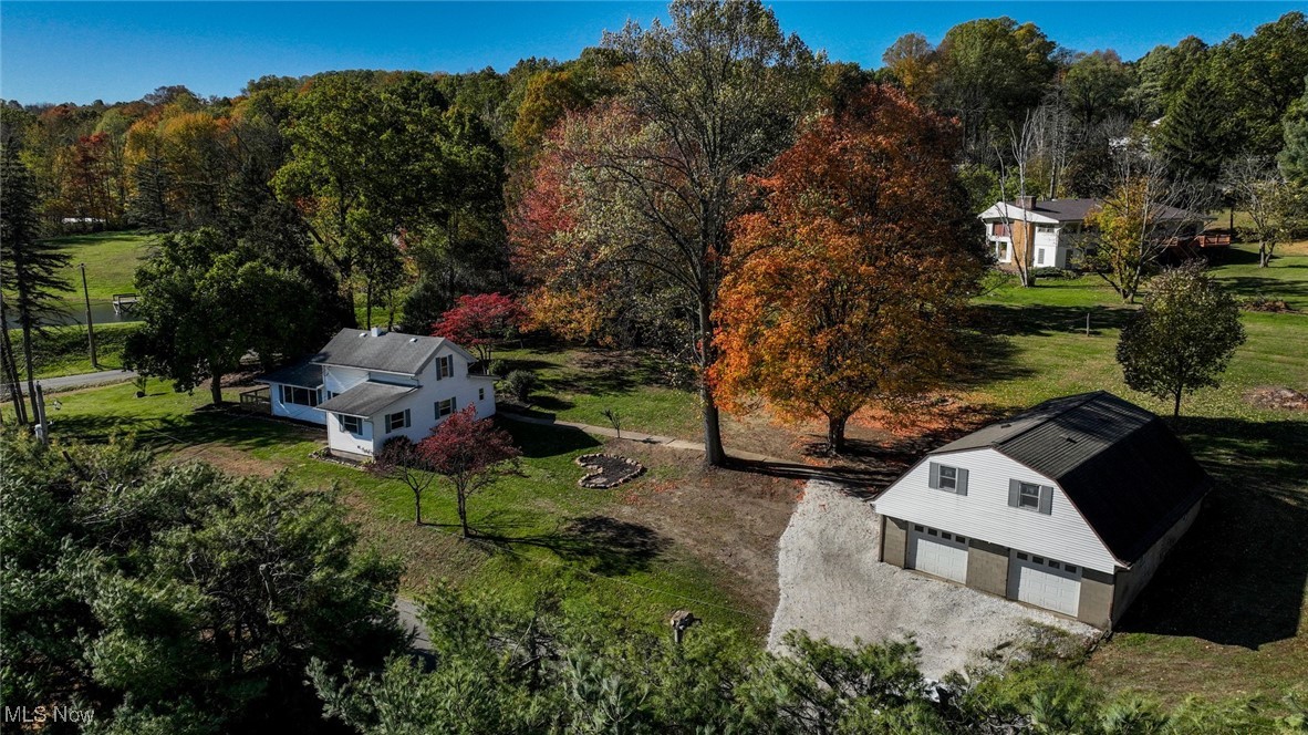 14328 Calaboone Road Doylestown, OH 44230 - Photo 8 of 45 Aerial view of home and garage, and beautiful treed lot
