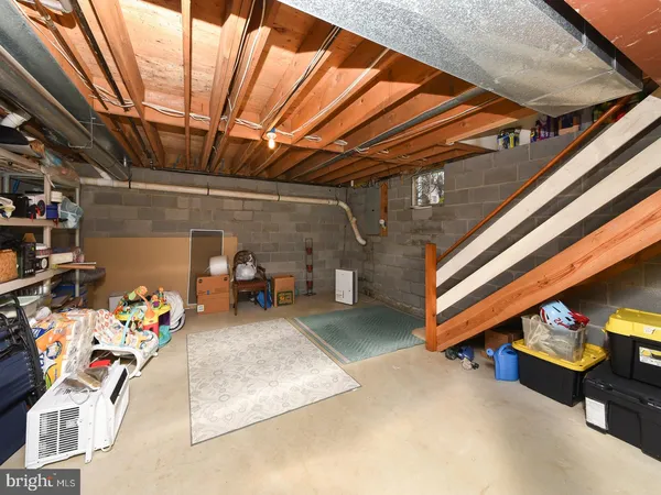 a view of a house with a yard and garage
