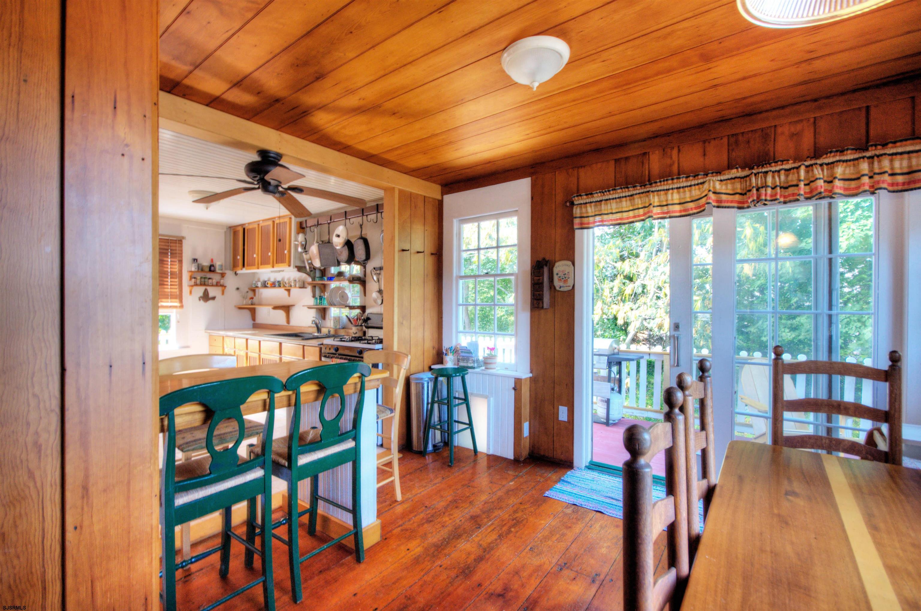 115 Rte 50 Woodbine, NJ 08270 - Photo 13 of 56 a view of a dining room with furniture window and wooden floor