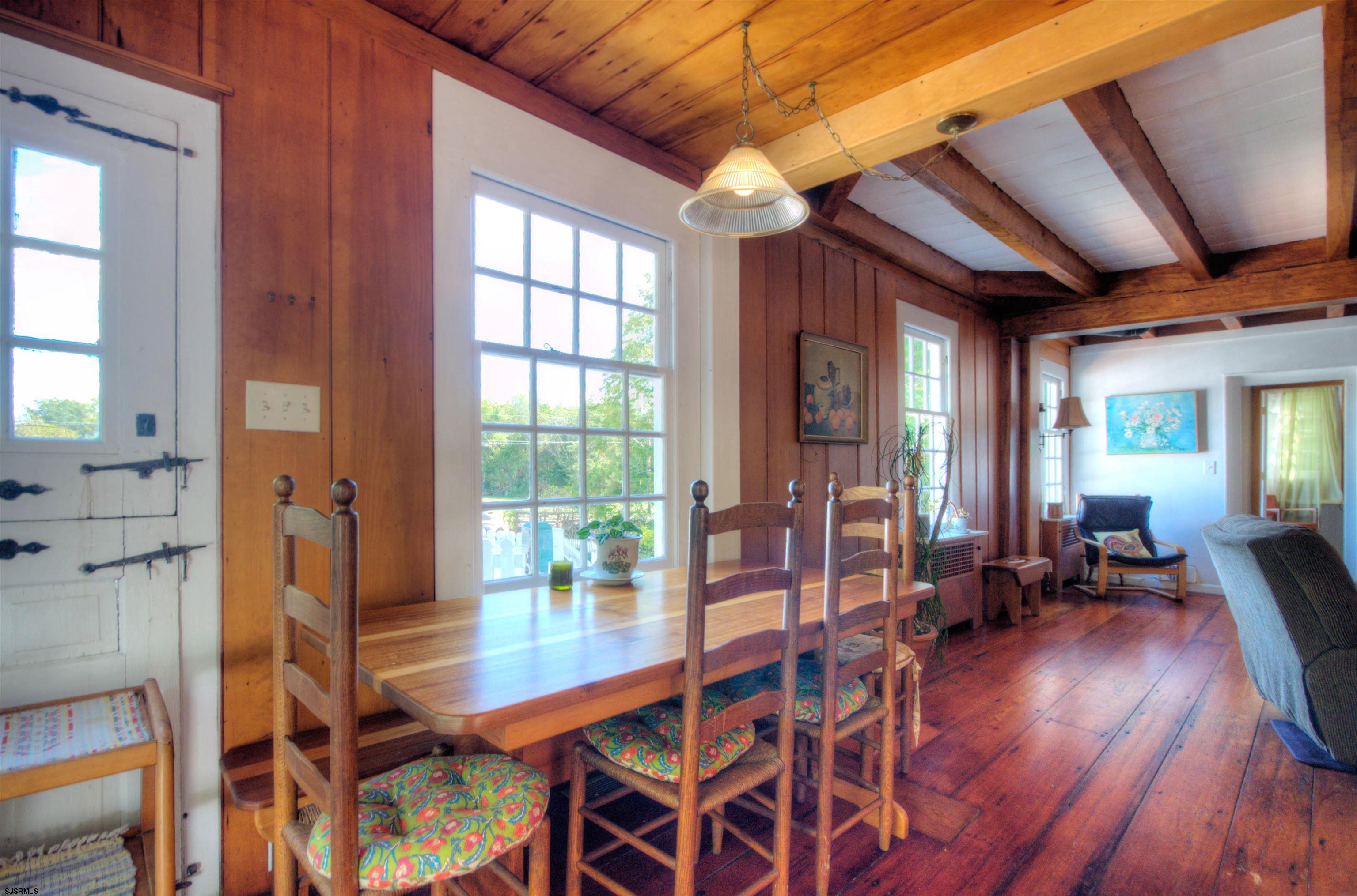 115 Rte 50 Woodbine, NJ 08270 - Photo 17 of 56 a view of a dining room with furniture window and wooden floor