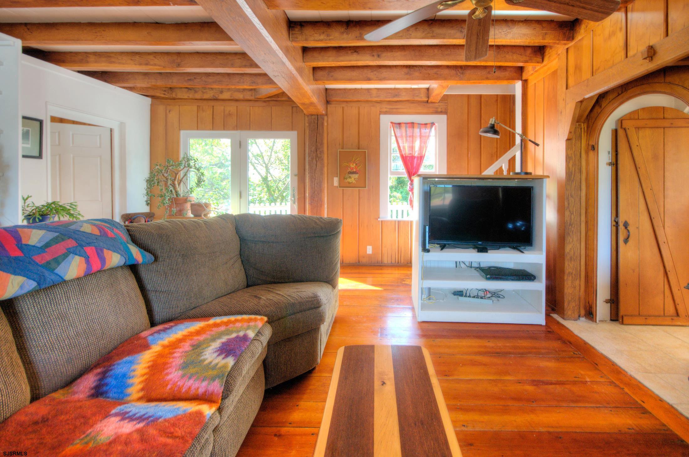 115 Rte 50 Woodbine, NJ 08270 - Photo 22 of 56 a living room with furniture and a flat screen tv