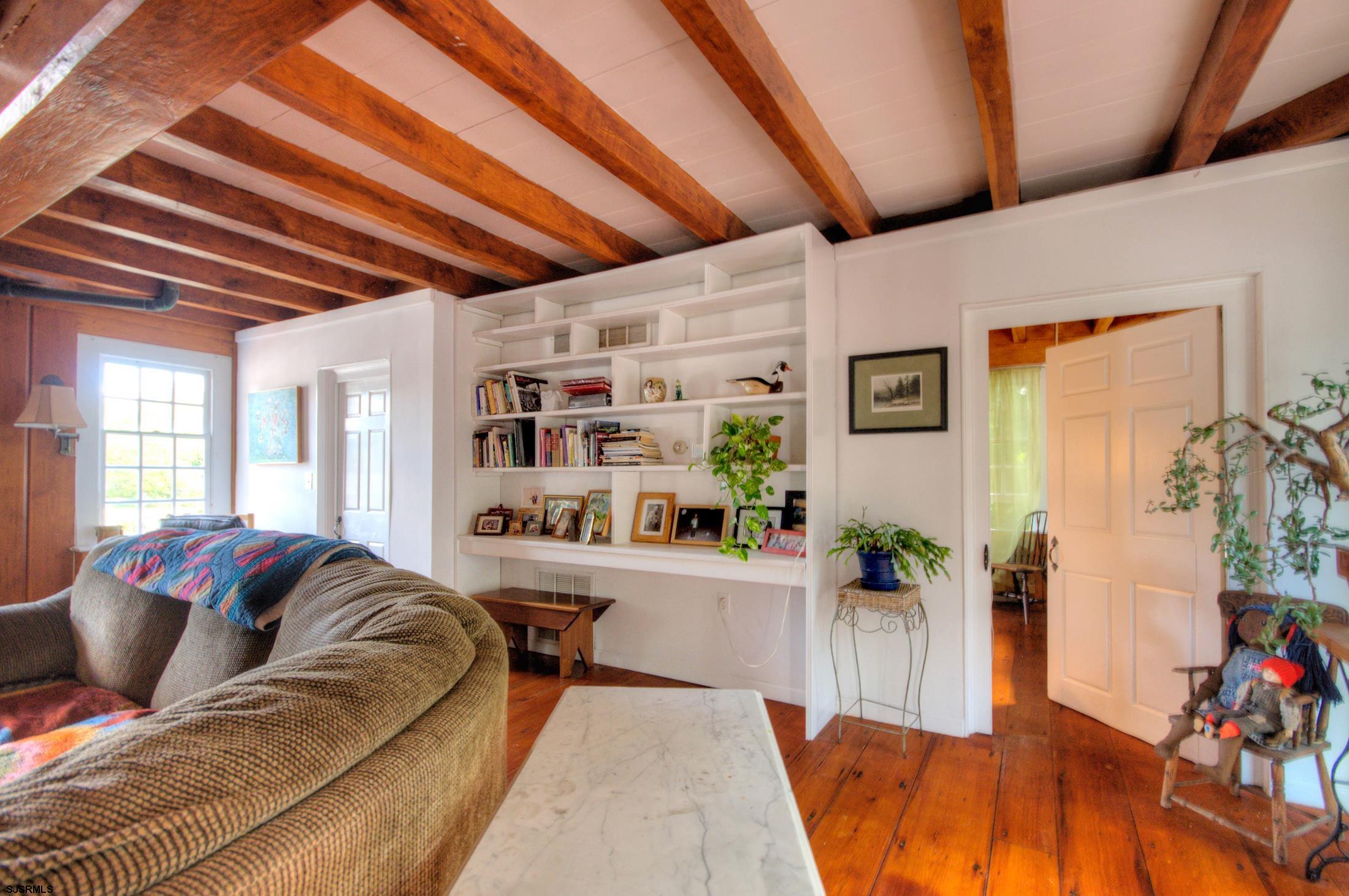 115 Rte 50 Woodbine, NJ 08270 - Photo 25 of 56 a living room with furniture and a wooden floor