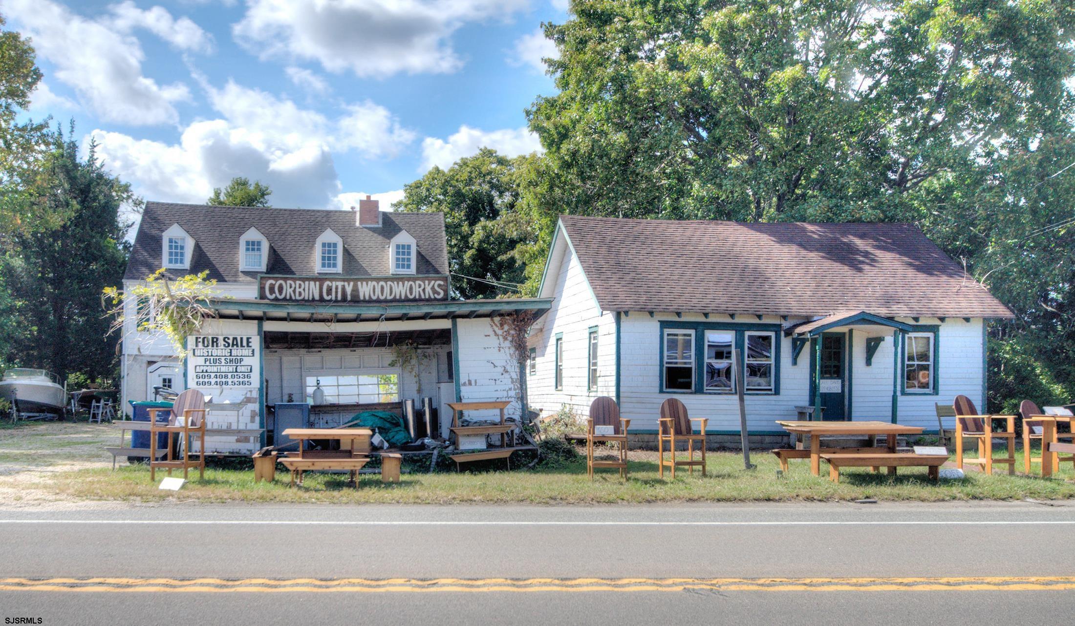 115 Rte 50 Woodbine, NJ 08270 - Photo 3 of 56 a view of a big house with many windows and a table and chairs